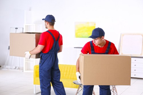 Moving truck and packed boxes representing Movers Waterloo services