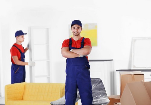 Professional movers handling furniture during a Waterloo home move