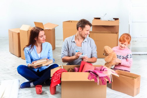 Packed boxes and moving supplies ready for a removal van in Waterloo