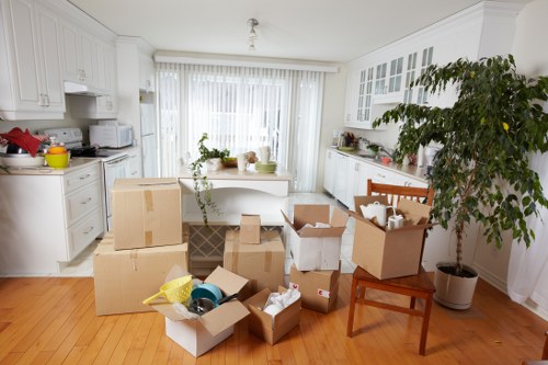 Packed moving boxes and furniture ready for removals in Waterloo
