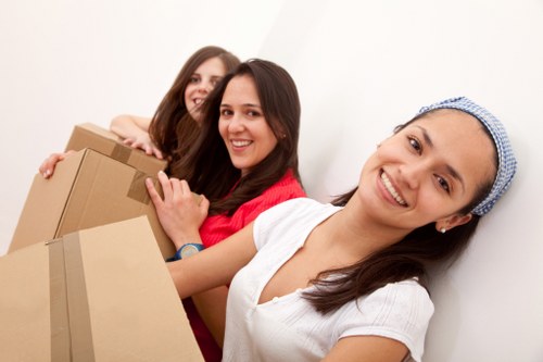 Team handling boxes and furniture for a professional move