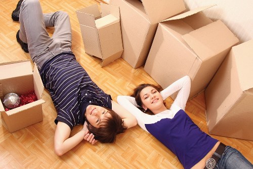 Waterloo moving team handling boxes and furniture during relocation